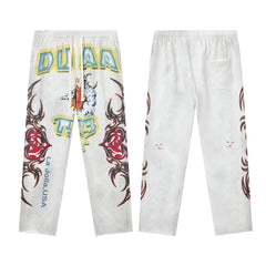 DUAA White Tattoo‑Style Graphic Sweatpants