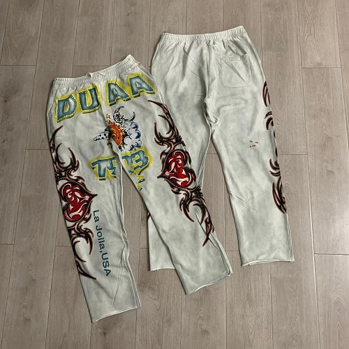 DUAA White Tattoo‑Style Graphic Sweatpants