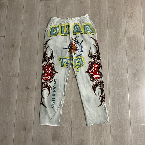 DUAA White Tattoo‑Style Graphic Sweatpants