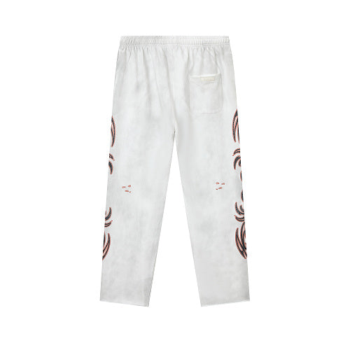 DUAA White Tattoo‑Style Graphic Sweatpants