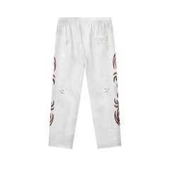 DUAA White Tattoo‑Style Graphic Sweatpants