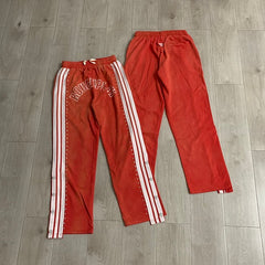 Roughplay Red Side‑Stripe Flare Sweatpants