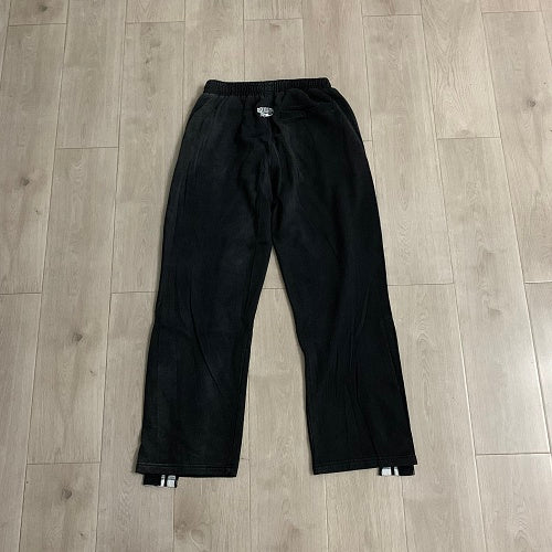 Roughplay Black Side‑Stripe Flare Sweatpants