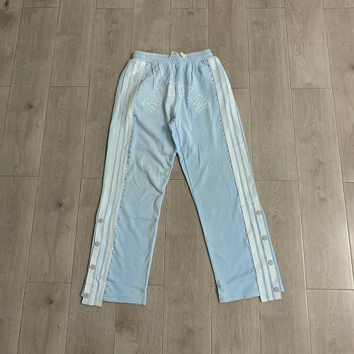 Roughplay Side‑Stripe Flare Sweatpants